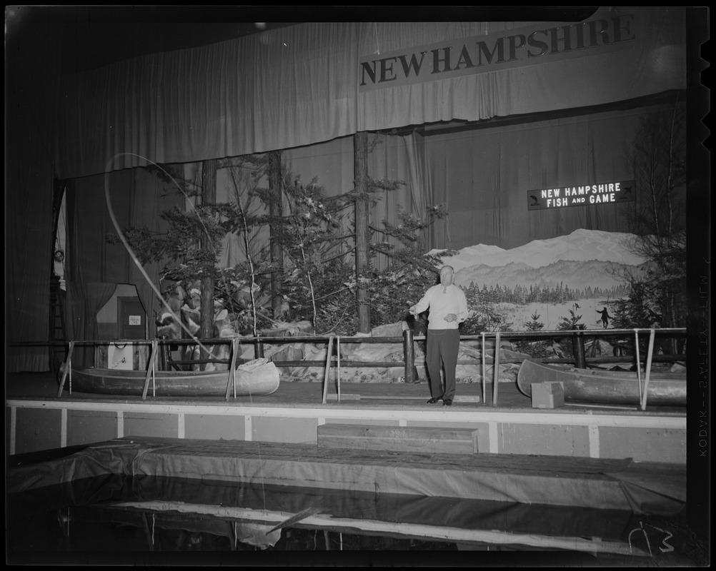 Jack Sharkey with a fishing pole at New England Sportsmen's Show