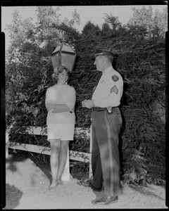 Stand-in for sis. Janet Auchincloss, 15-year-old stepsister of Jacqueline Kennedy, stands at entrance to the Kennedy home in Hyannisport as she gives EXCLUSIVE interview to the Boston AMERICAN. Janet is acting as an effective and charming buffer between Jackie and the outside world