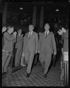 Under Secretary of State W. Averell Harriman walking down aisle of Massachusetts State House with others to applause