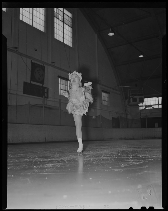 Barbara Ann Scott skating in costume at ice rink