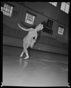 Barbara Ann Scott skating in costume at ice rink