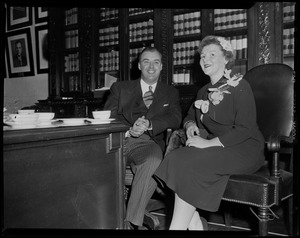 Lt. Gov. Sumner G. Whittier having tea with woman in office