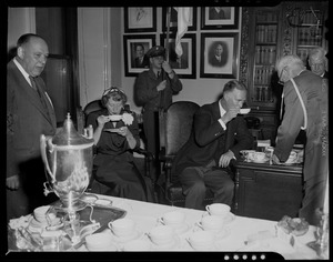 Gov. Christian Herter and Mary Pratt Herter drinking tea in office, with others in attendance