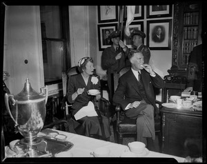 Gov. Christian Herter and Mary Pratt Herter having tea in office