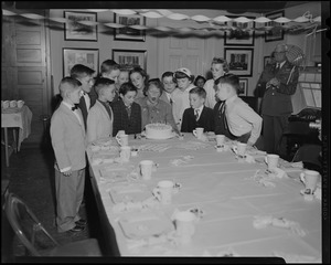 Mrs. Herter at birthday celebration for Governor Herter and boys with same birthday