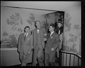 Governor Christian Herter, Massachusetts Commissioner of Public Works John A. Volpe, and others descending stairs