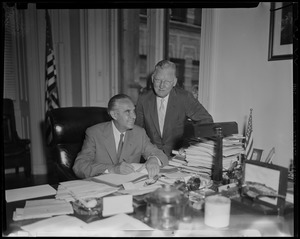 New York Governor Averell Harriman seated at desk with Boston Mayor John B. Hynes