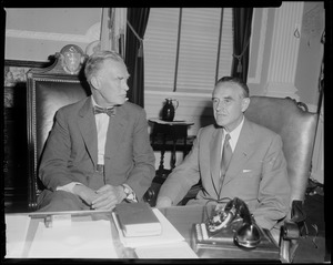 New York Governor Averell Harriman seated at desk with Massachusetts Governor Christian Herter