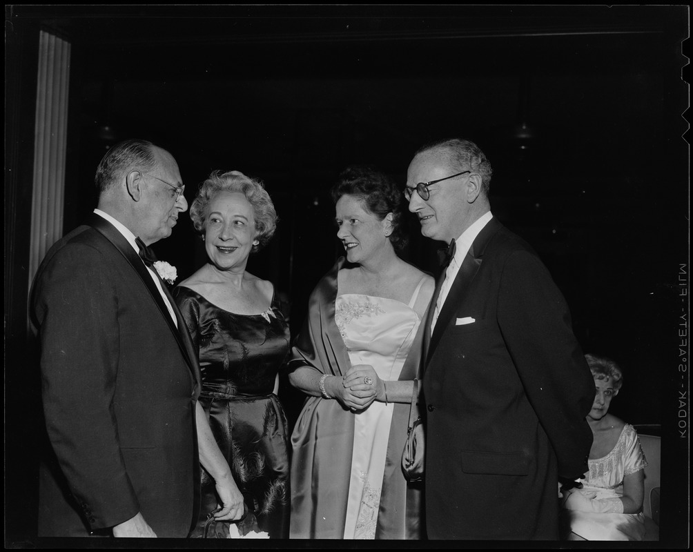 Sidney R. Rabb and Esther V. Rabb talking to other man and woman at the ...