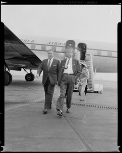 Gene Kelly of PAA staff and UN Secretary General Dag Hammarskjold at East Boston Airport