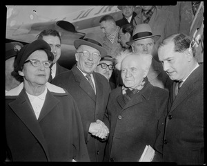 Lt. Governor Robert F. Murphy and David Ben-Gurion shaking hands, with Paula Ben-Gurion, Ambassador Avraham Harman, and others