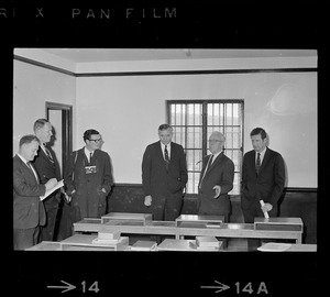 Unidentified man, Sheriff John W. Sears, unidentified man, Boston city councilor Patrick McDonough, Jail Master Vincent Rice, and Boston city councilor Gerald F. O'Leary during City Council tour of Charles Street Jail