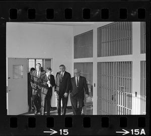 Boston city councilors Gerald F. O'Leary and Patrick McDonough are flanked by Sheriff John W. Sears (left) and Charles St. Jail Master Vincent Rice. The council toured the escape-wracked, 120-year-old institution