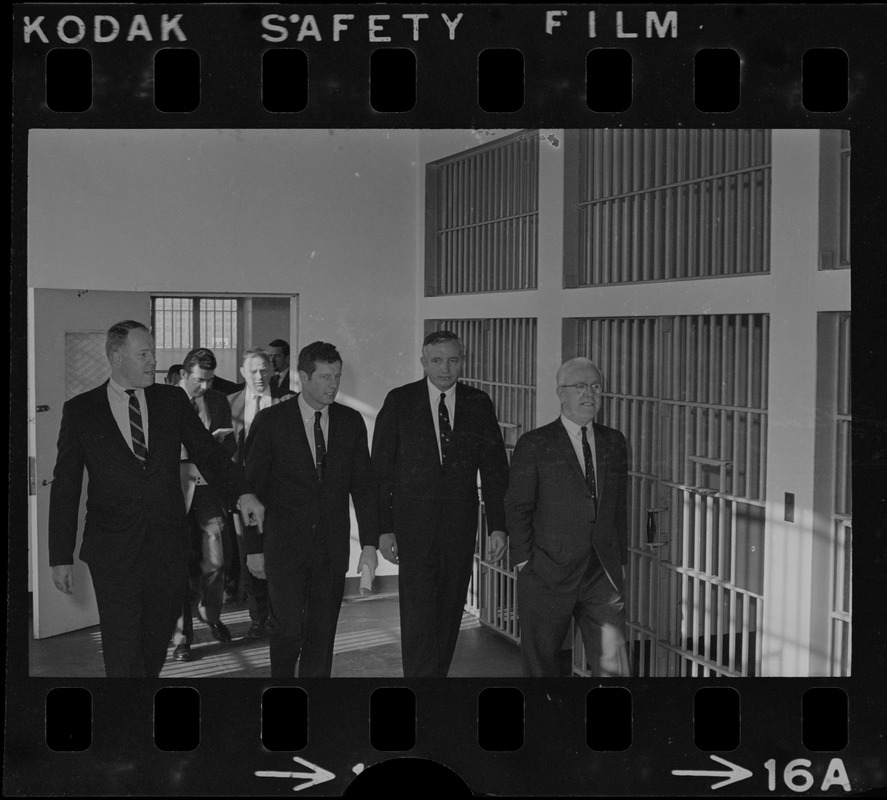 Boston city councilors Gerald F. O'Leary and Patrick McDonough are flanked by Sheriff John W. Sears (left) and Charles St. Jail Master Vincent Rice. The council toured the escape-wracked, 120-year-old institution