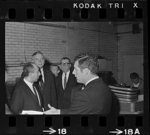 Unidentified man, Boston city councilor Patrick McDonough, unidentified man, and Boston city councilor Gerald F. O'Leary during City Council tour of Charles Street Jail