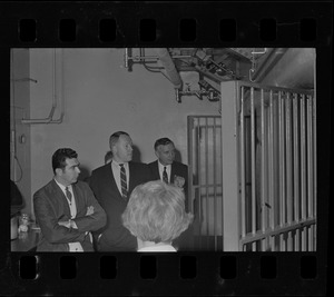 Unidentified man, Sheriff John W. Sears, unidentified man, and Boston city councilor Patrick McDonough during City Council tour of Charles Street Jail