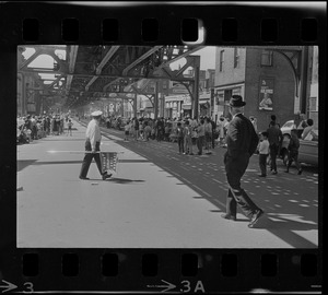 People noticing small fire during Bunker Hill Day parade