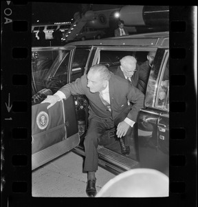 President Lyndon B. Johnson and House Speaker John W. McCormack in limousine at Logan Airport
