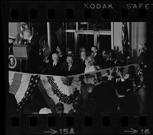 House Speaker John W. McCormack, President Lyndon B. Johnson, and Kathryn White on speakers' platform at campaign rally in Post Office Square