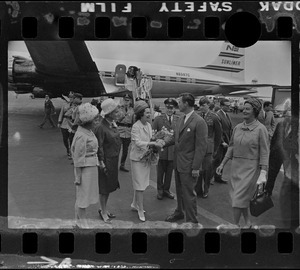 Lady Bird Johnson greeted at Logan Airport by Mary Collins, Toni Peabody, Gov. Endicott Peabody, and Helen Gilbert