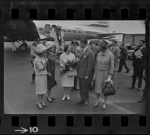 Lady Bird Johnson greeted at Logan Airport by Mary Collins, Toni Peabody, Gov. Endicott Peabody, and Helen Gilbert