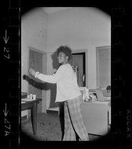 Black student at Brandeis enjoys some mod dancing while she awaits Pres. Abram's next move