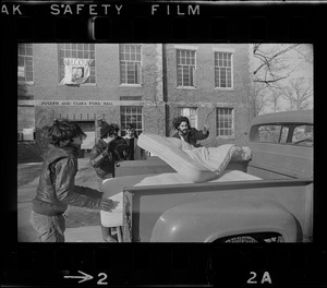 Students putting mattresses into a truck outside Ford Hall at Brandeis University, Waltham, where Black student protestors have taken over the building