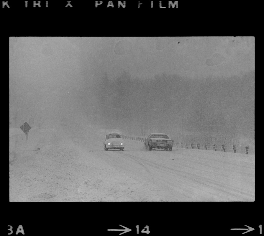 Cars on snowy road during nor'easter