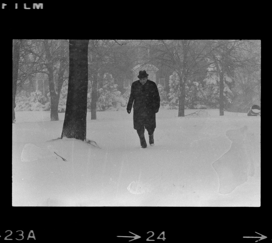 Man walking outside during nor'easter