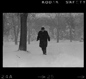 Man walking outside during nor'easter
