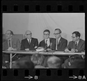 Mitchell Goodman, Benjamin Spock, Michael Ferber, unidentified man, and Marcus Raskin at "Boston Five" press conference at Arlington Street Church
