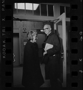 Jane Spock and Dr. Benjamin Spock at the Federal Building in Boston for arraignment of "Boston Five" on charges of aiding draft resisters
