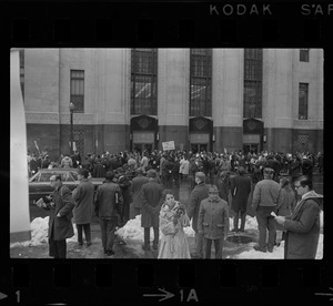 Protesters outside the Federal Building in Boston during arraignment of the "Boston Five" on charges of aiding draft resisters
