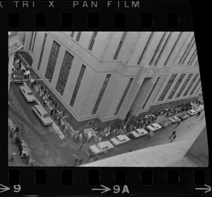 Supporters of Dr. Spock, and some who opposed his stand on the Vietnam war, marched around the Federal Building in Boston while the doctor and four other foes of the fighting were appearing at a hearing
