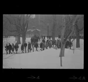 Anti-draft demonstration marching across Boston Common in snow