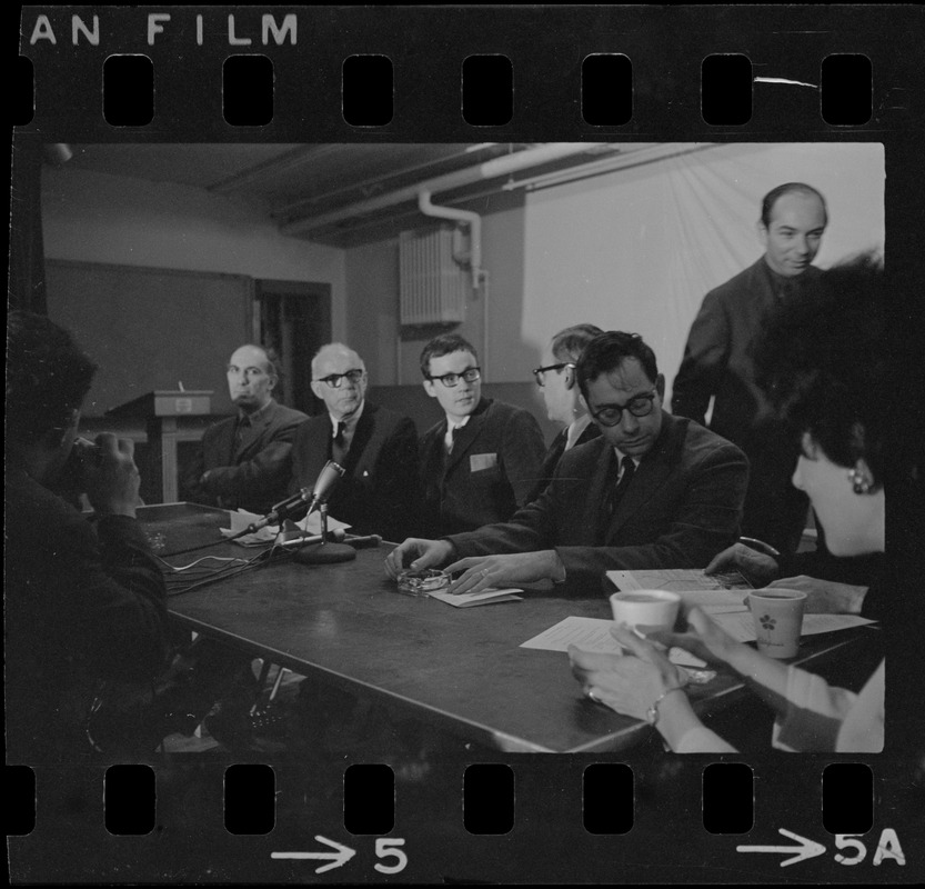 Mitchell Goodman, Benjamin Spock, Michael Ferber, unidentified man, and Marcus Raskin at "Boston Five" press conference at Arlington Street Church