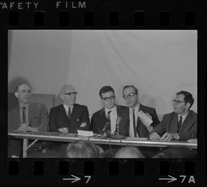 Mitchell Goodman, Benjamin Spock, Michael Ferber, unidentified man, and Marcus Raskin at "Boston Five" press conference at Arlington Street Church