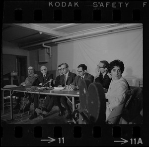 Mitchell Goodman, Benjamin Spock, Michael Ferber, unidentified man, Marcus Raskin, and William Sloane Coffin at "Boston Five" press conference at Arlington Street Church