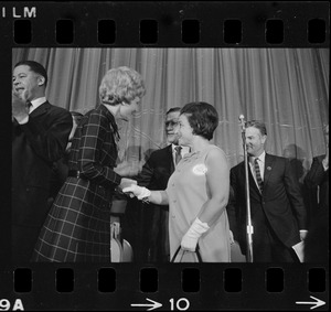 Pat Nixon greeting Gov. John Volpe and Jennie Volpe during Richard Nixon campaign rally at Somerset Hotel
