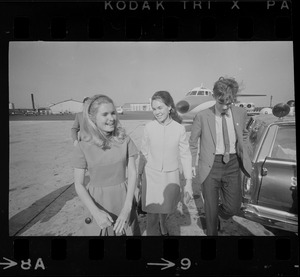 Tricia Nixon, Julie Nixon, and David Eisenhower arriving at Logan Airport