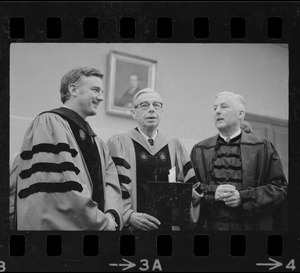Reviewing the graduation ceremonies were, from left, Harvard president-elect Derek C. Bok, former Pres. James B. Conant, and outgoing Pres. Nathan M. Pusey
