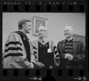 Reviewing the graduation ceremonies were, from left, Harvard president-elect Derek C. Bok, former Pres. James B. Conant, and outgoing Pres. Nathan M. Pusey