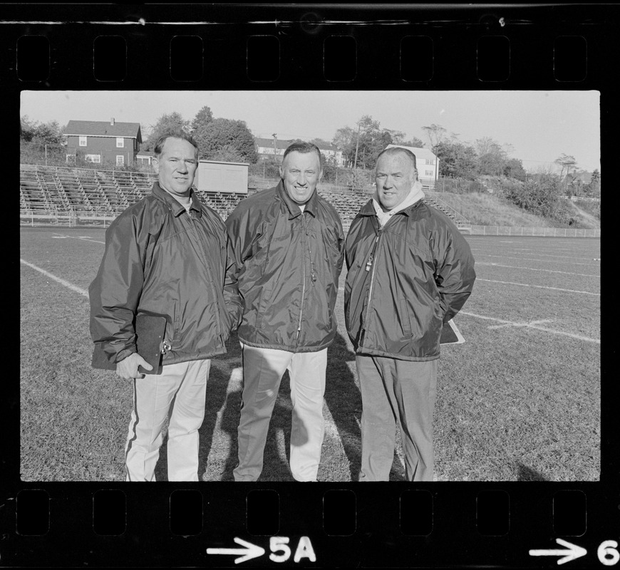 Ralph Bevins, Ed Burns, and Robert Hill of Arlington High School football