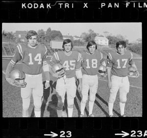 Arlington High School football players Jim Lutz, Jack Duffett, Dan