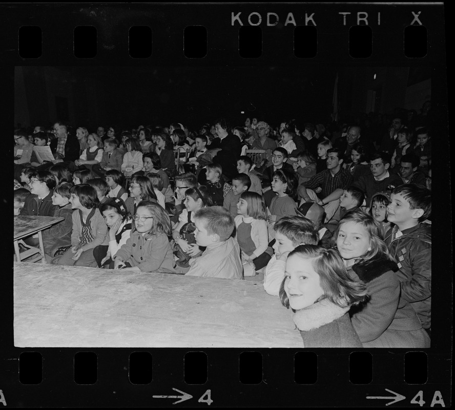 Audience watching performance of "Puss in Boots -- The Canterbury Cat" by the Charles Playhouse Musical Theatre for Children at War Memorial Auditorium