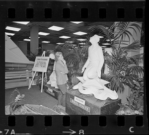 Olga Firth of Dover admires statue in the Park & Recreation exhibit at War Memorial Auditorium