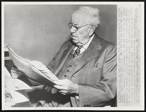 The Man Who Named the Cornhuskers -- Charles S. (Cy) Sherman, the man who put the tag of “Cornhuskers” on the Nebraska athletic teams, looks over a paper in the office of the Lincoln Star which he visits daily. He retired in 1946 after 31 years as sports editor of The Star. During that time Cy was almost a legendary character in Nebraska and national sports circles.