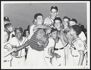 Toast of Newton, and of his Newton West Little League teammates, is Pitcher Mike Gradone after he fanned 17 Augusta, Me., batters in 6-3 win at Woburn for divisional L. L. championship. Catcher Joe Luchette (left) shared hero’s role, getting three hits, two of them homers.