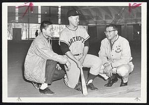 Captains And Dad -- Dartmouth, freshman and varsity baseball captains, Francis Ota, 18, left, and Henry Ota, 21, in center, discuss their favorite sport with their father, Harry Ota. They hail from Torrance, Calif.
