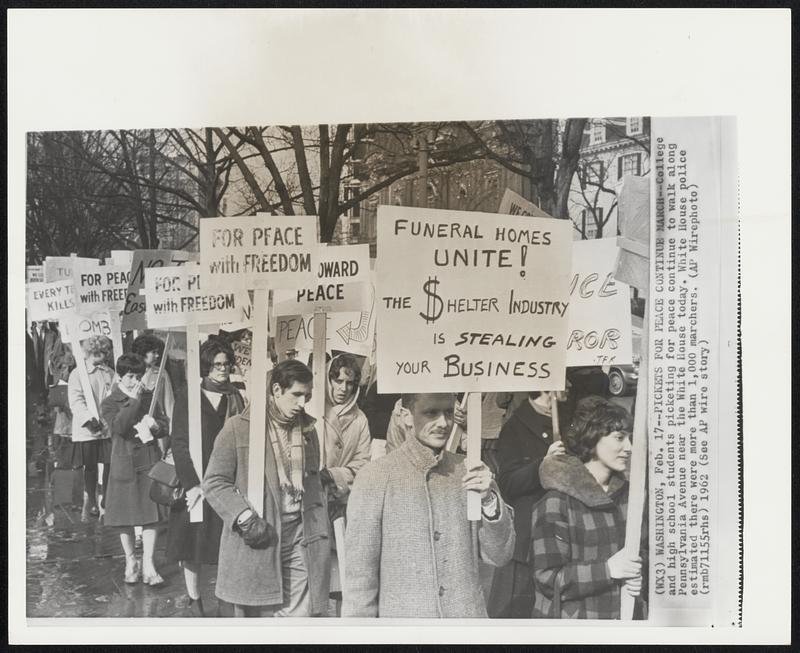 Pickets for Peace Continue March--college and high school students picketing for peace continue to walk along Pennsylvania Avenue near the White House today. White House police estimated there were more than 1,000 marchers.